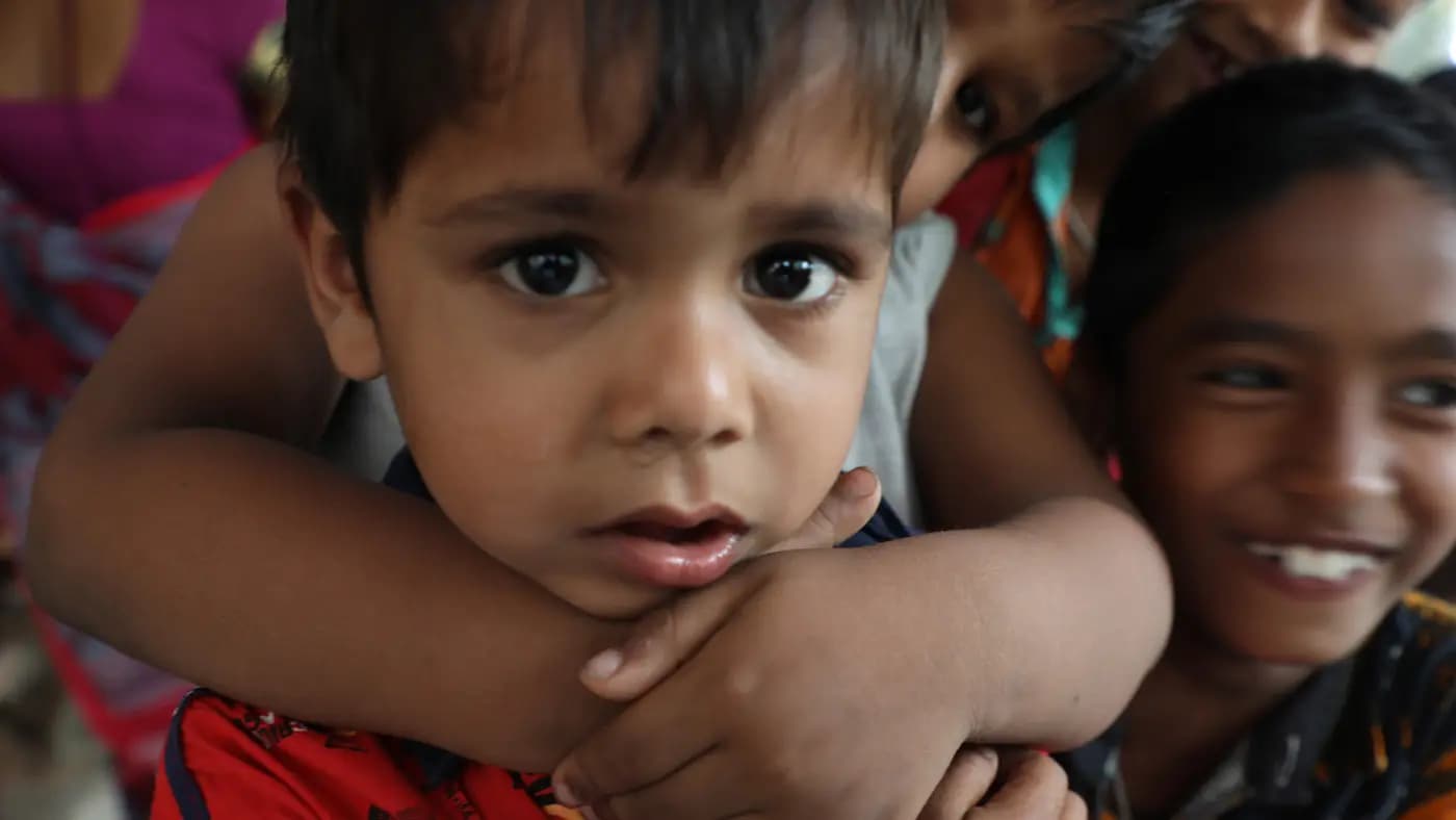 Close-up of smiling village children