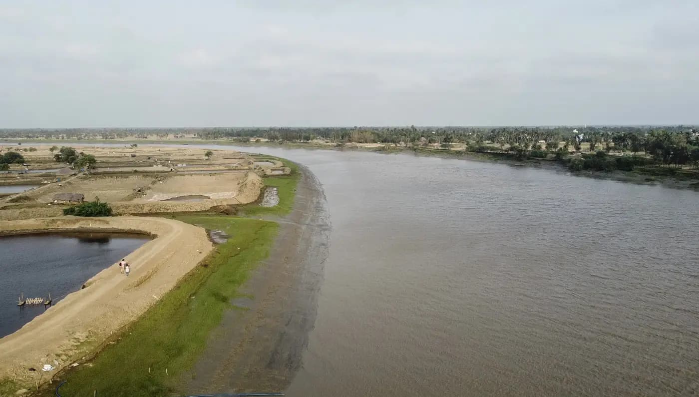 Rasulpur river bend with people walking on the embankment