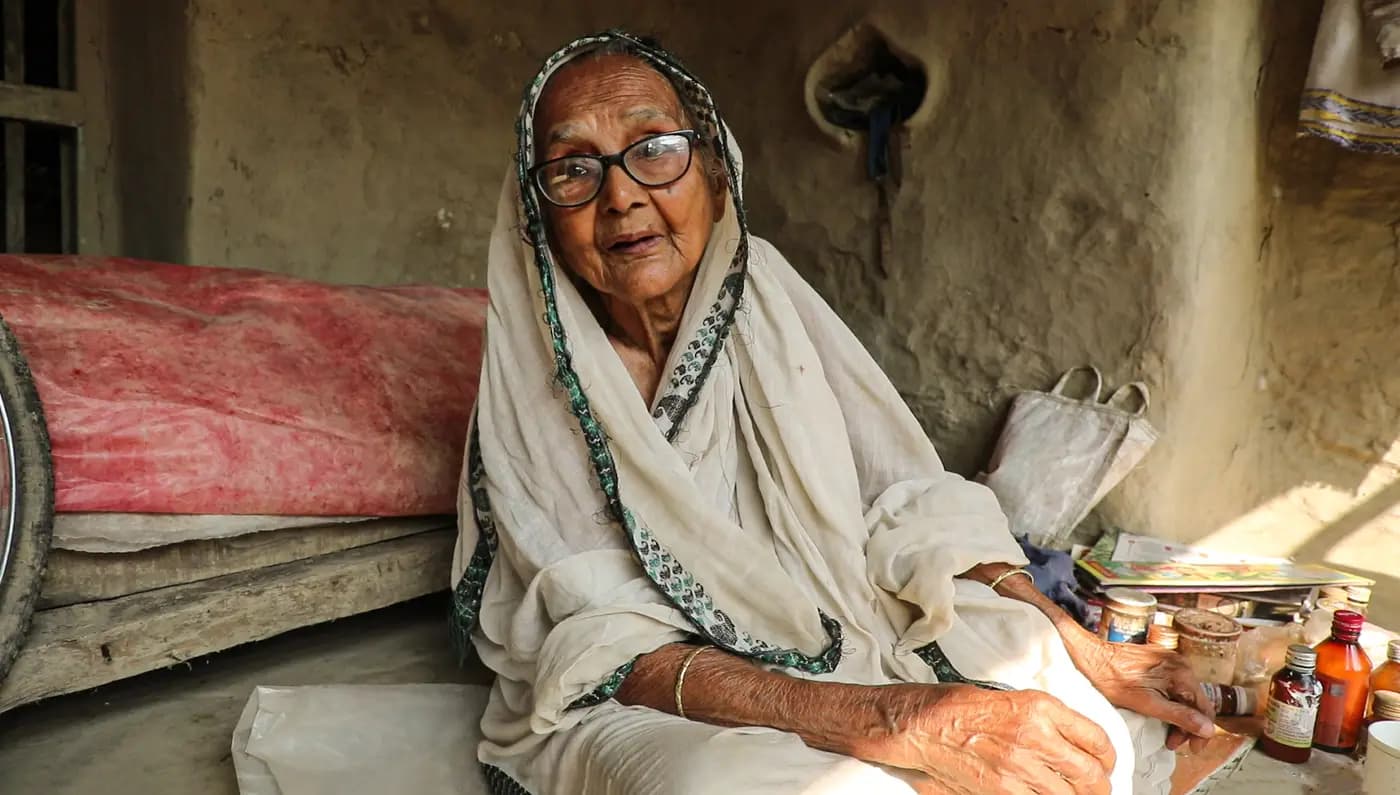 Portrait of Gitarani Maity with sari over her head