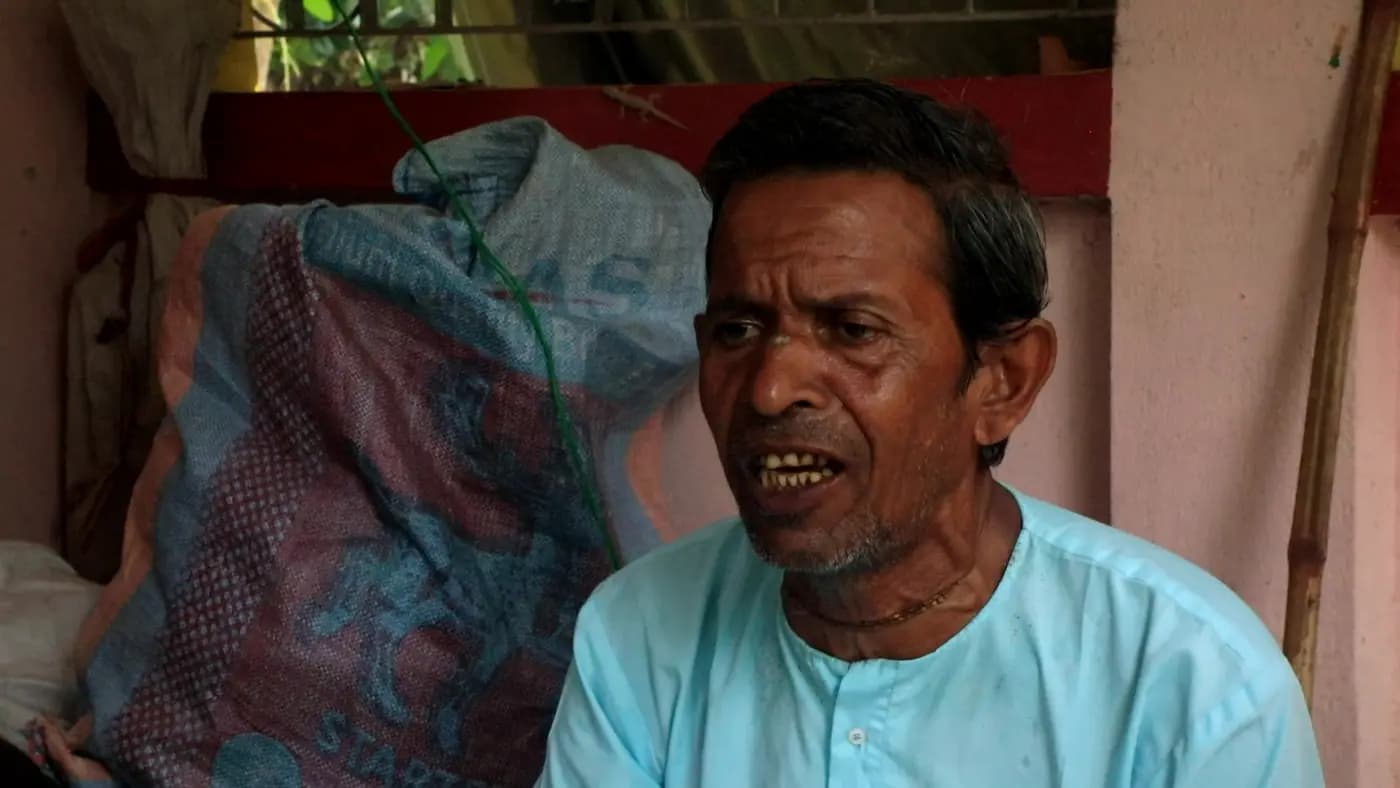 Portrait of an older Vaishnavite performer speaking