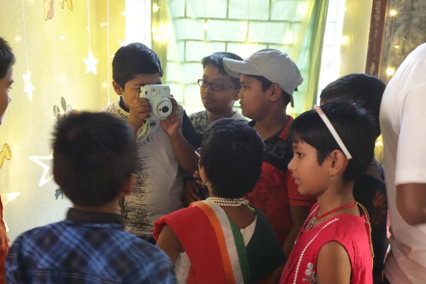 Children using an instant camera