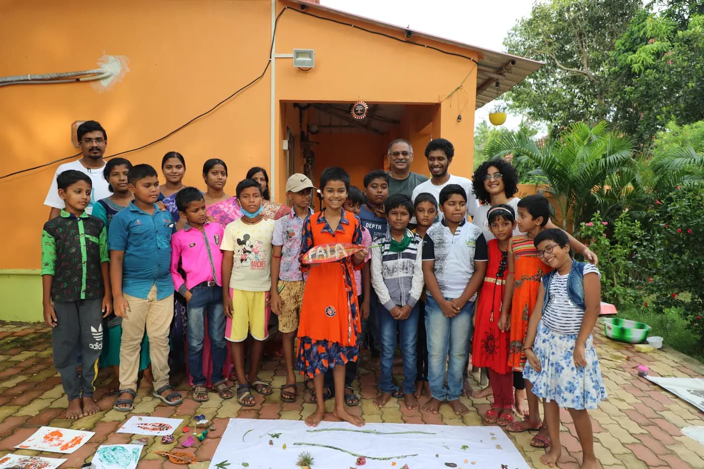 FALA children and facilitators with their artworks