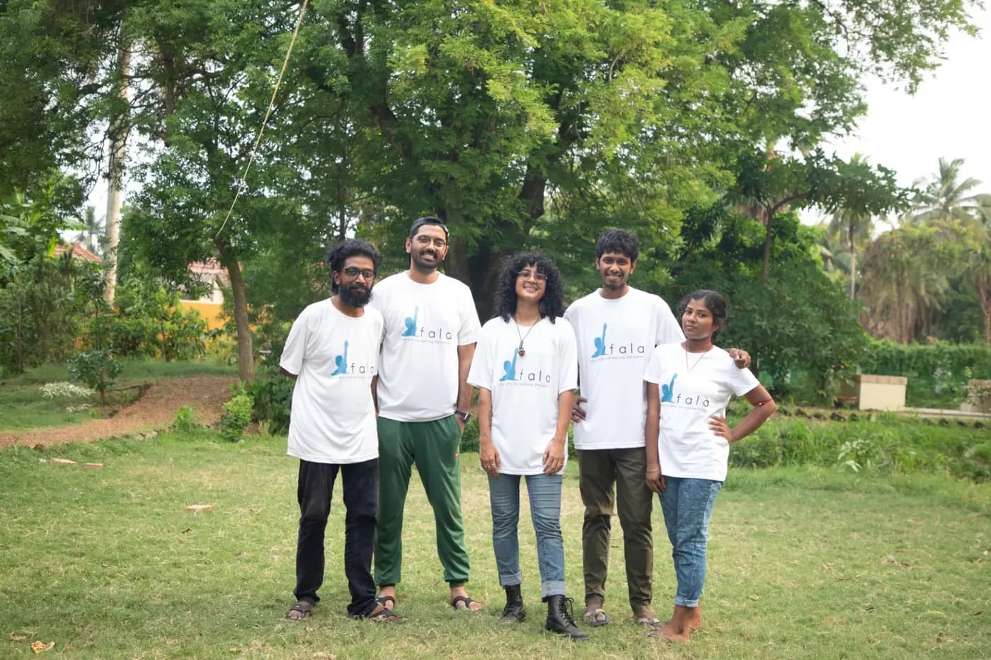 FALA team in FALA T-shirts on a lawn