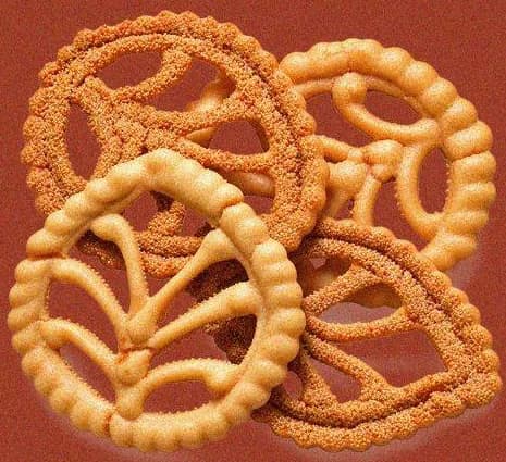 Fried Gohona Bori, lacy discs of lentil paste in leaf and flower patterns